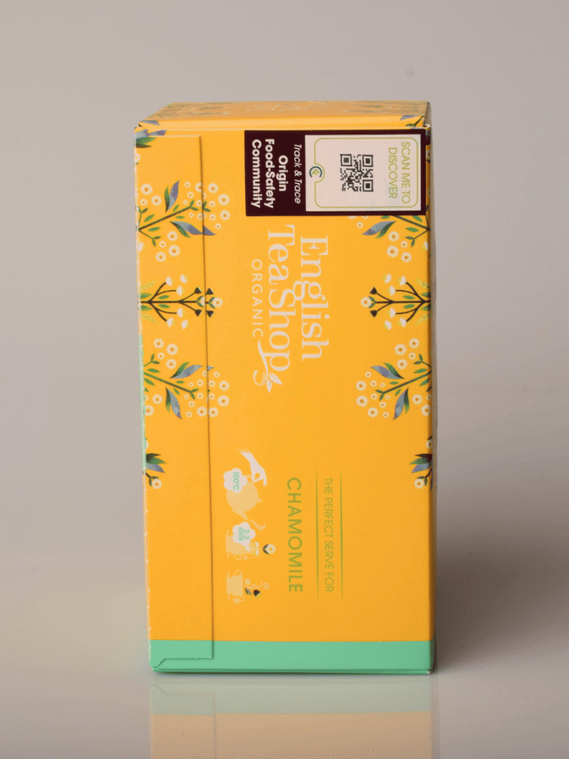 English Tea Shop Bio-Kamillentee in gelb-grüner Packung mit kleinen weißen Blütenmotiven